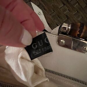Authentic Vintage Gucci bamboo white leather clutch.